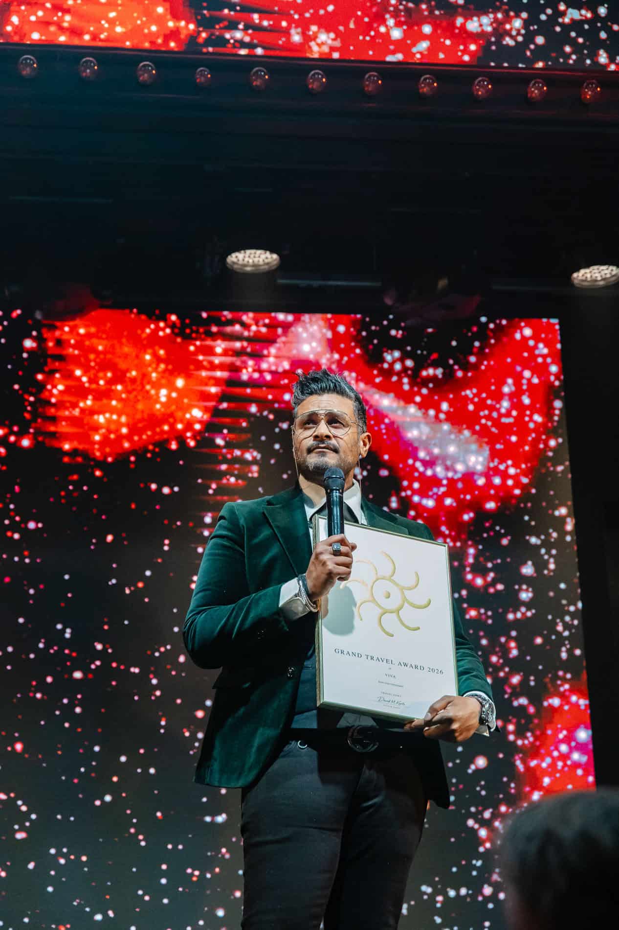 Profesjonell bedriftsfotograf Heidi Henriksen under en presentasjon.